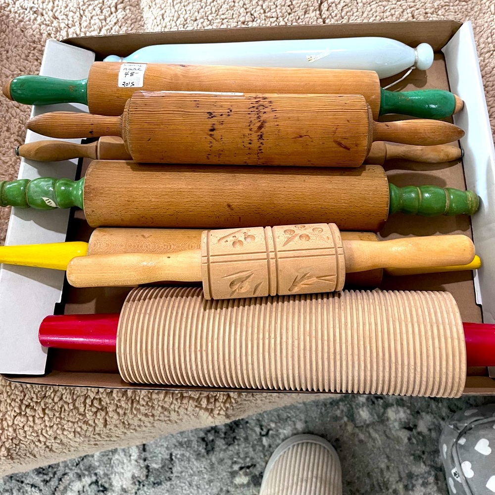 I have a collection of 8 old rolling pins
